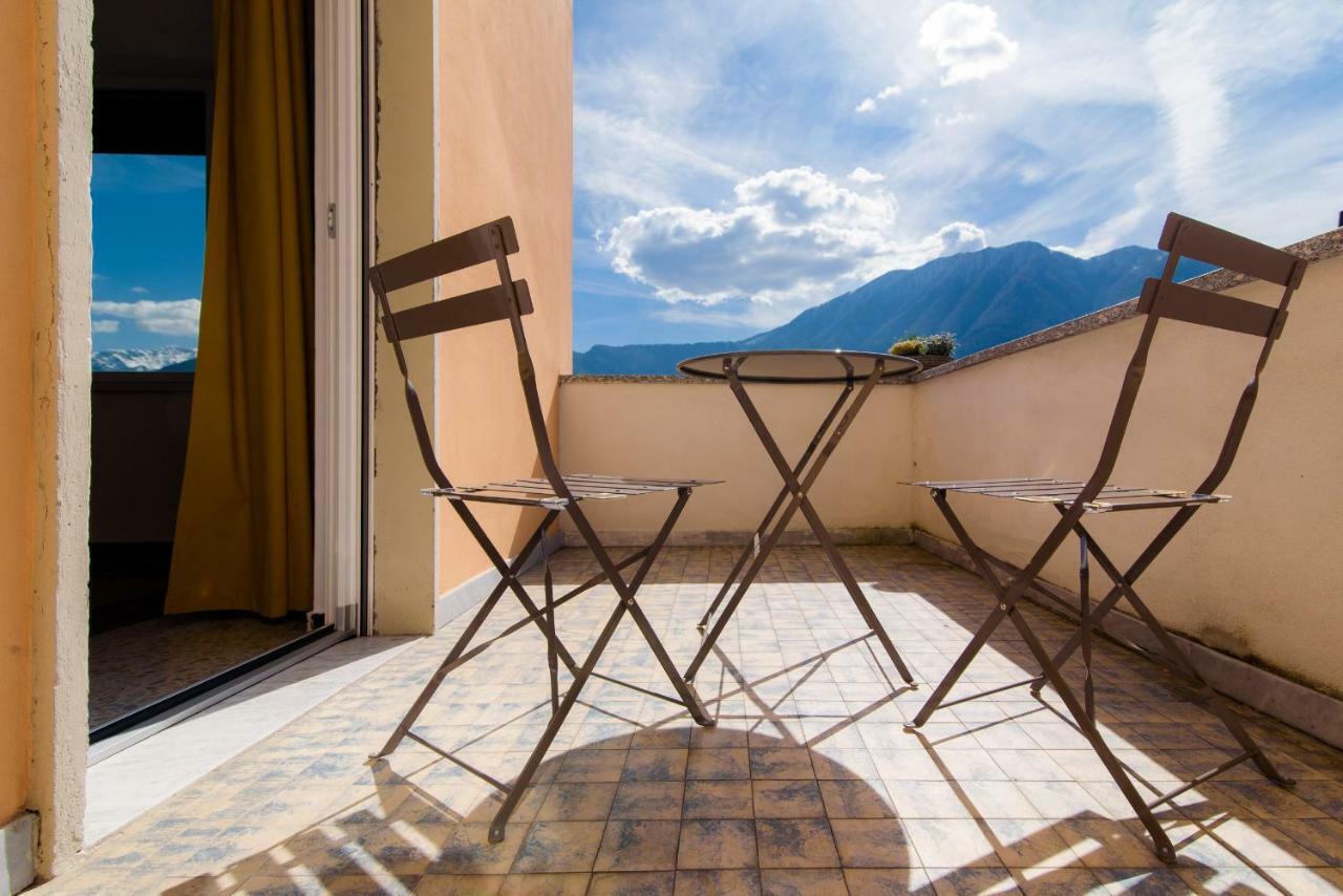 Al Pontile - The House Of Travelers Villa Sala Comacina Bagian luar foto