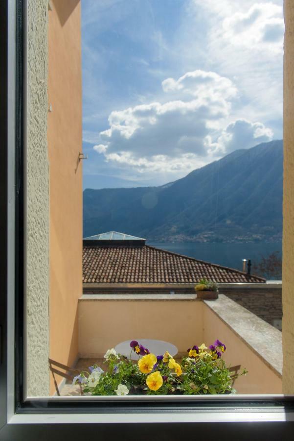 Al Pontile - The House Of Travelers Villa Sala Comacina Bagian luar foto