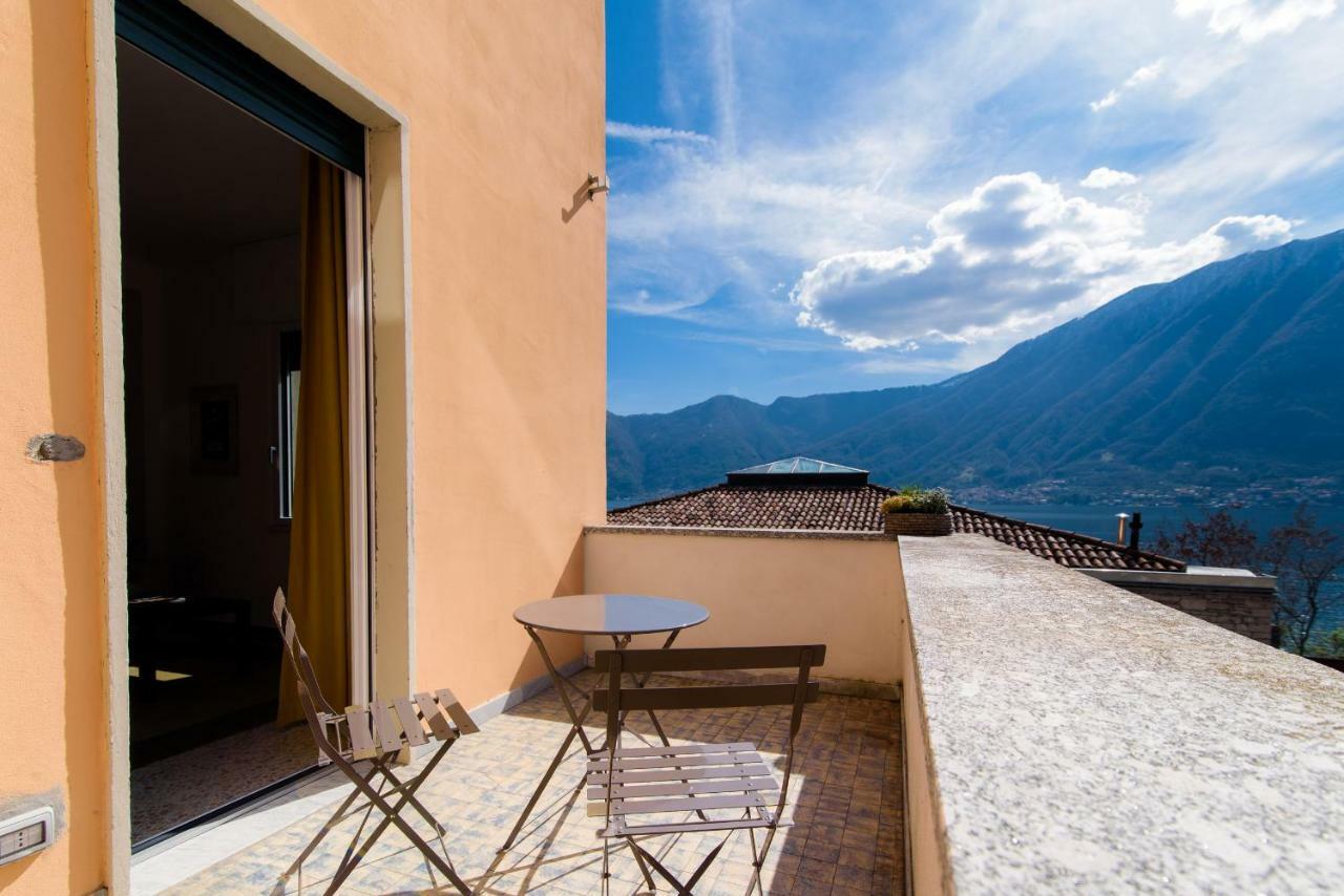 Al Pontile - The House Of Travelers Villa Sala Comacina Bagian luar foto