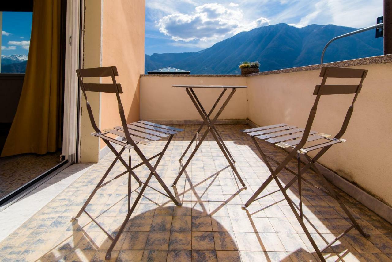 Al Pontile - The House Of Travelers Villa Sala Comacina Bagian luar foto