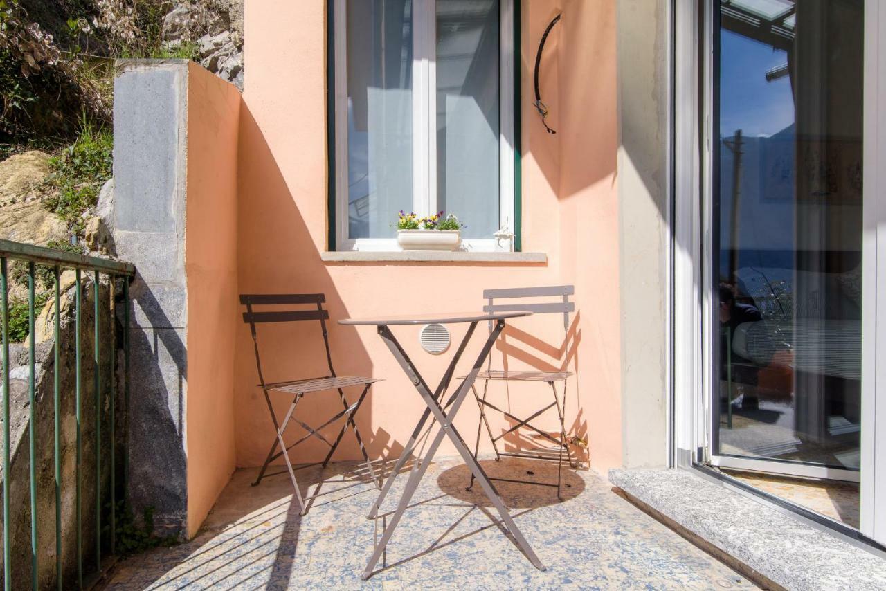 Al Pontile - The House Of Travelers Villa Sala Comacina Bagian luar foto