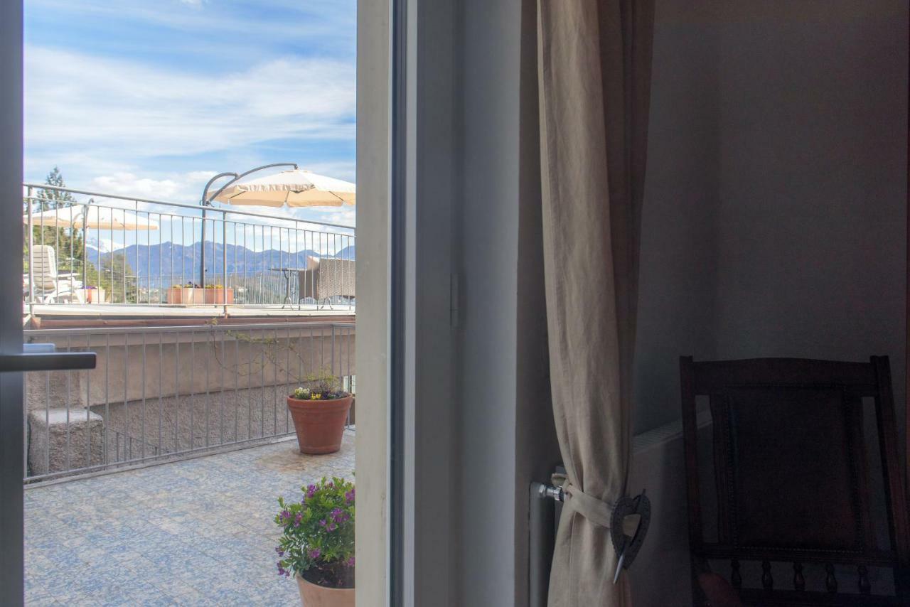 Al Pontile - The House Of Travelers Villa Sala Comacina Bagian luar foto